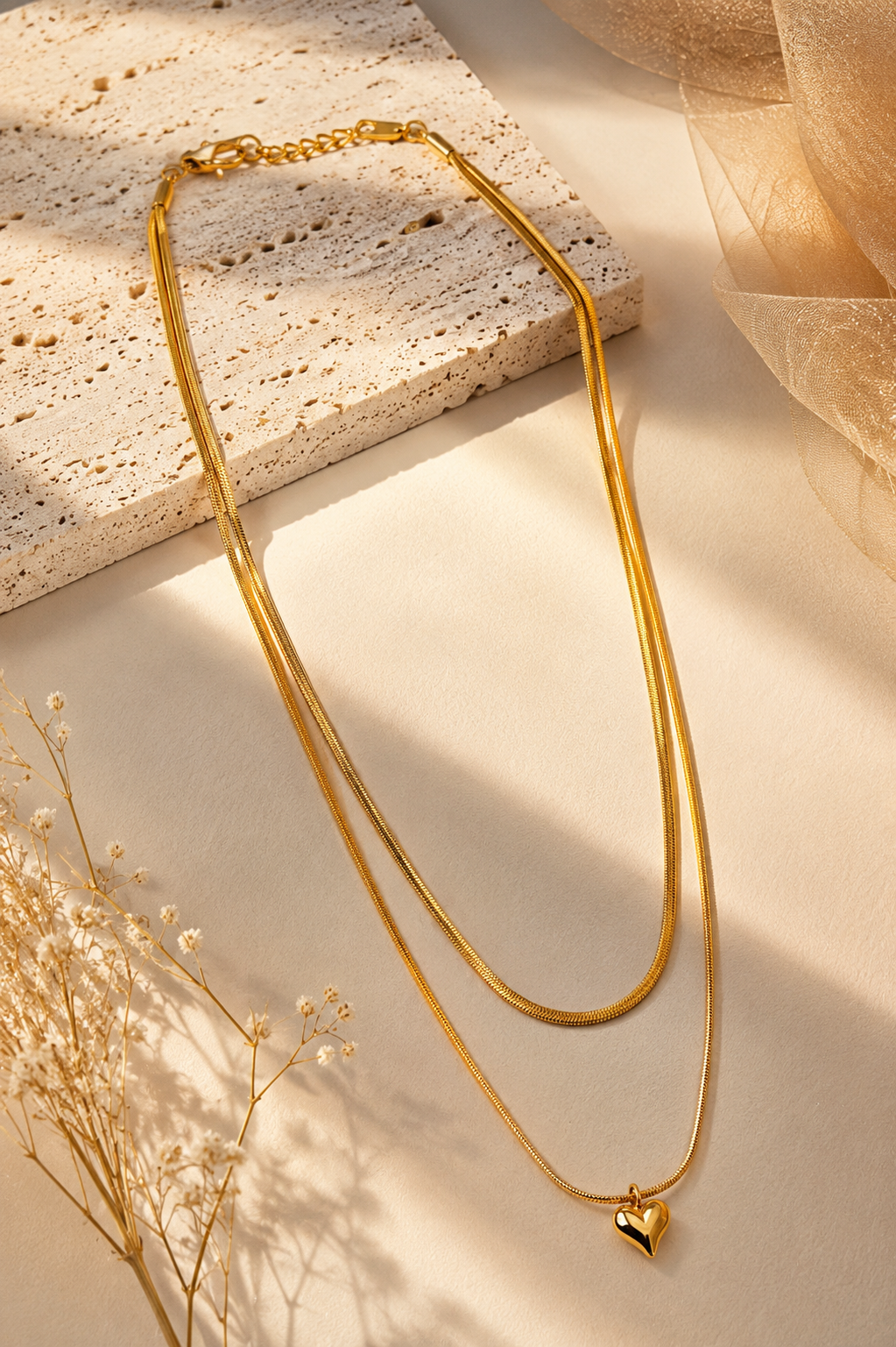 Gold two layered chain with heart pendant